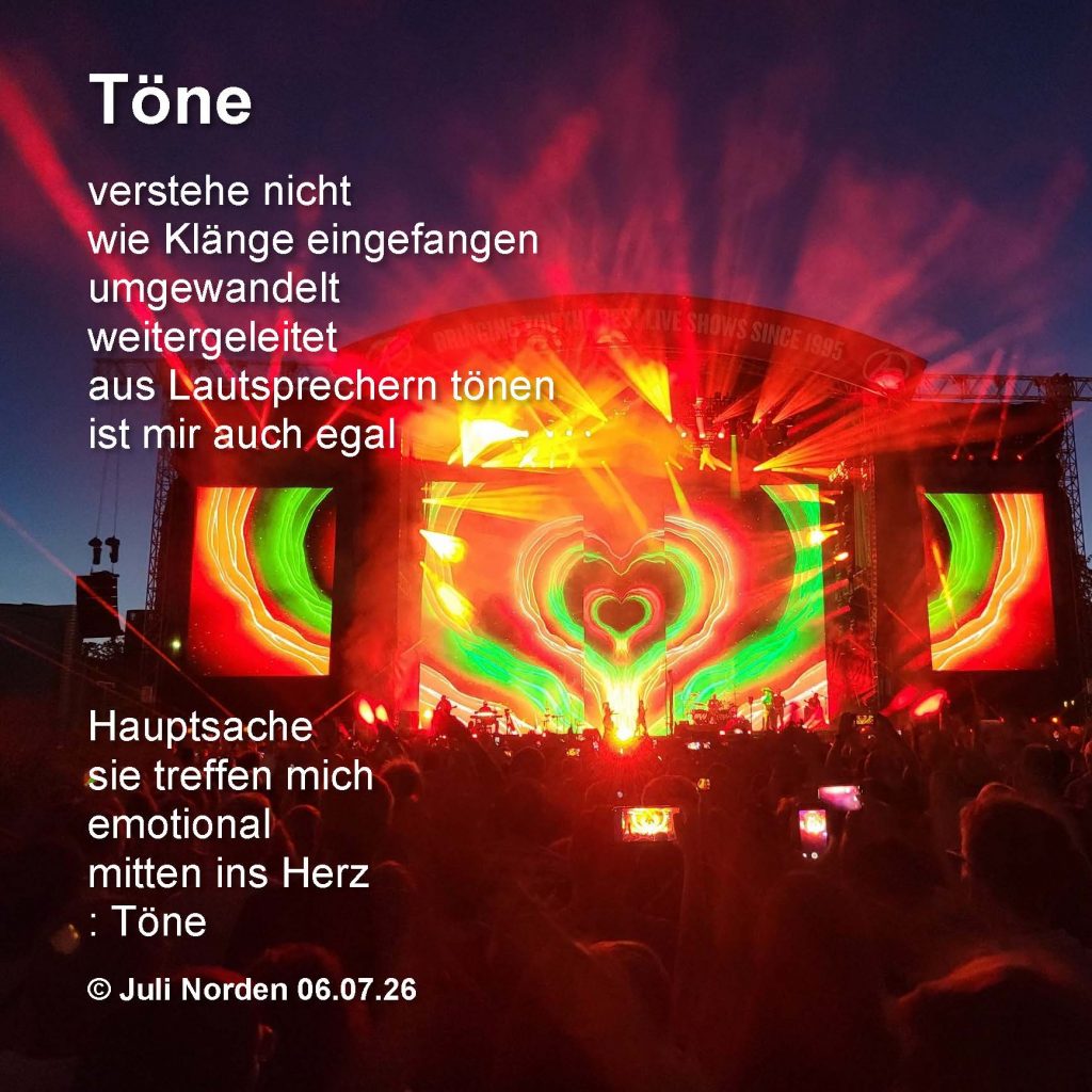 Gedicht "Töne" von Juli Norden 06.07.26, auf dem Foto das Schlussbühnenbild mit illuminiertem Herz beim Konzert von Robbie Williams in Luxemburg am 6.7.26